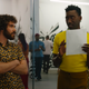 Kyle Kaminsky as Grady Greenberg and Nathan Stewart-Jarrett as Troy Cartwright stand in an art gallery in Candyman.